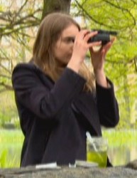 sally-warring-uses-field-microscope-outdoors-in-frnt-of-pond-image-from-tvnz-crop